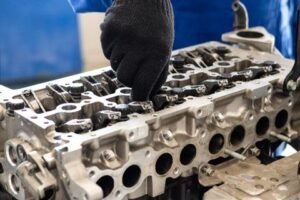 Small Business Websites 55 Mechanic repairing a car engine in a garage
