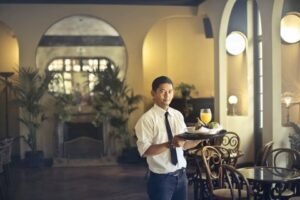 Small Business Websites 52 Waiter serving in a restaurant
