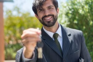 Small Business Websites 47 Estate agent handing over house keys